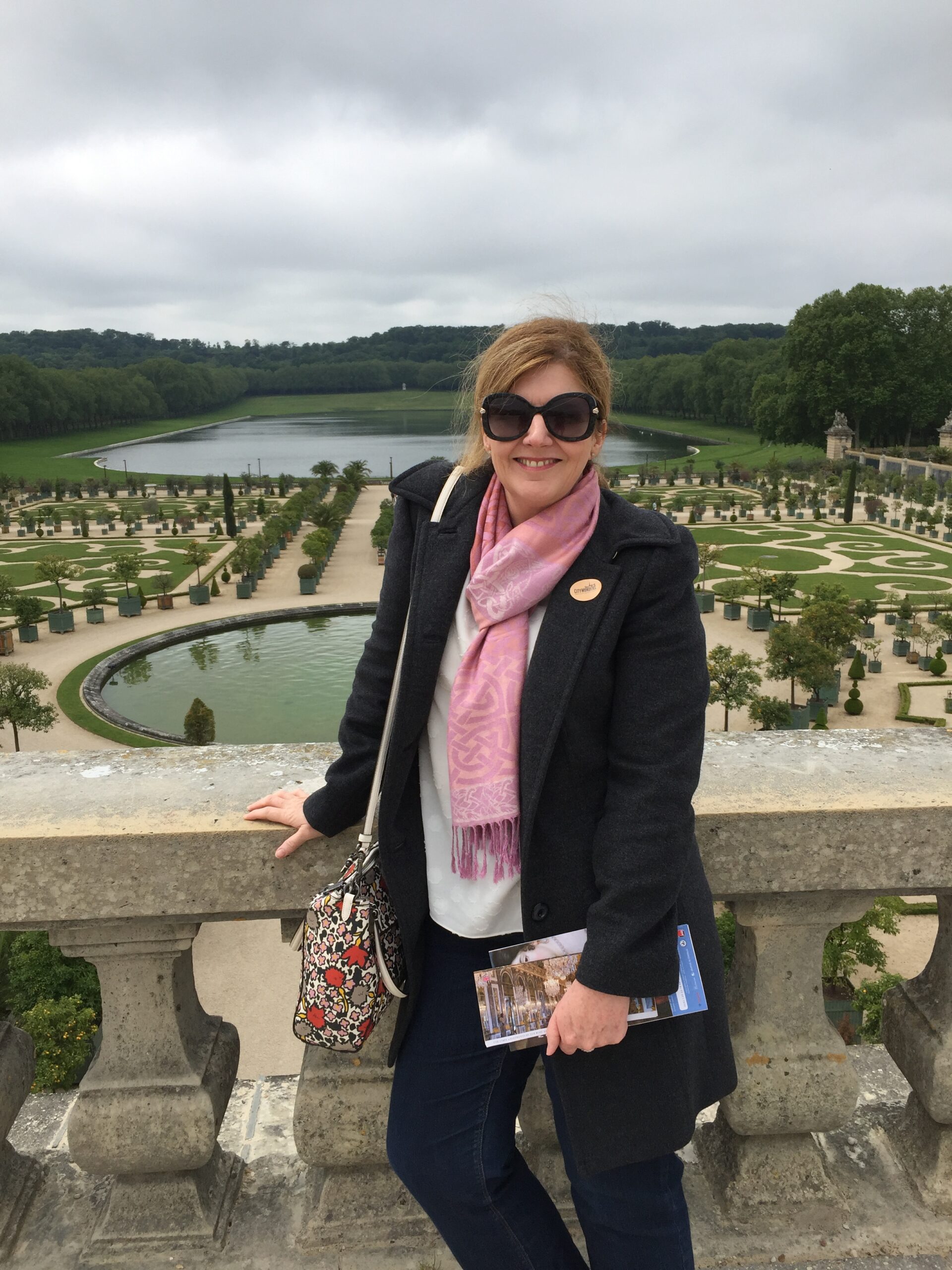 Kelly loves travelling the world and seeing new places. Here she is getting her steps up exploring the Gardens of Versailles in France.